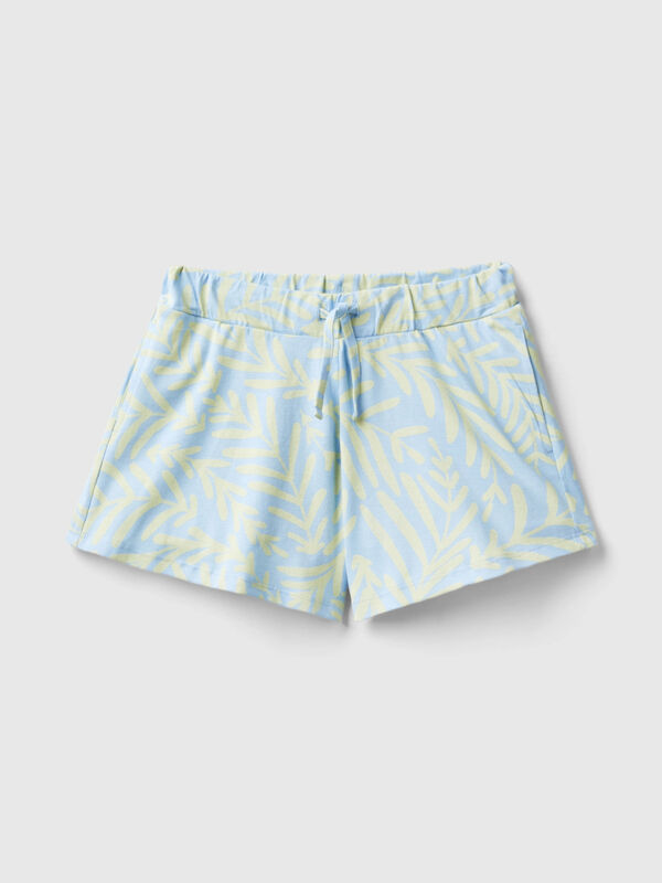 Light blue shorts with tropical print Junior Girl