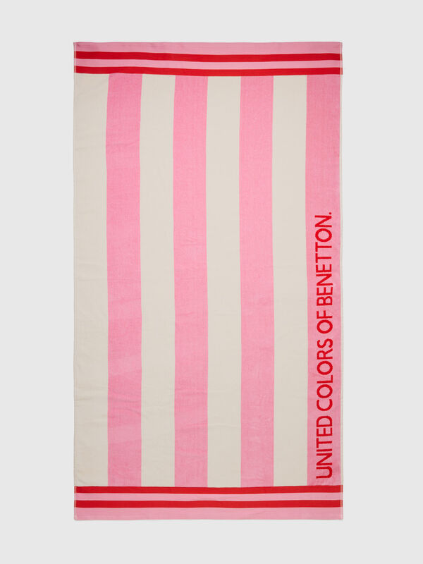 Beach towel with white and pink stripes