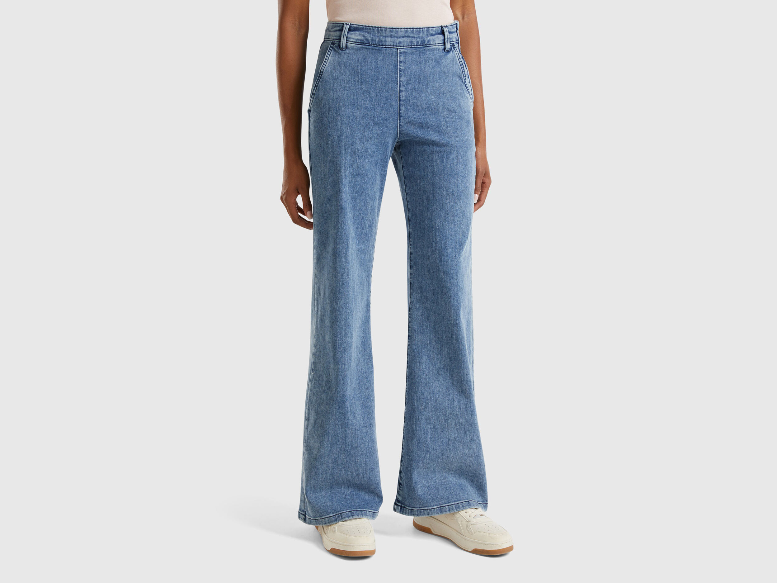 Flared jeans with zip Blue Benetton